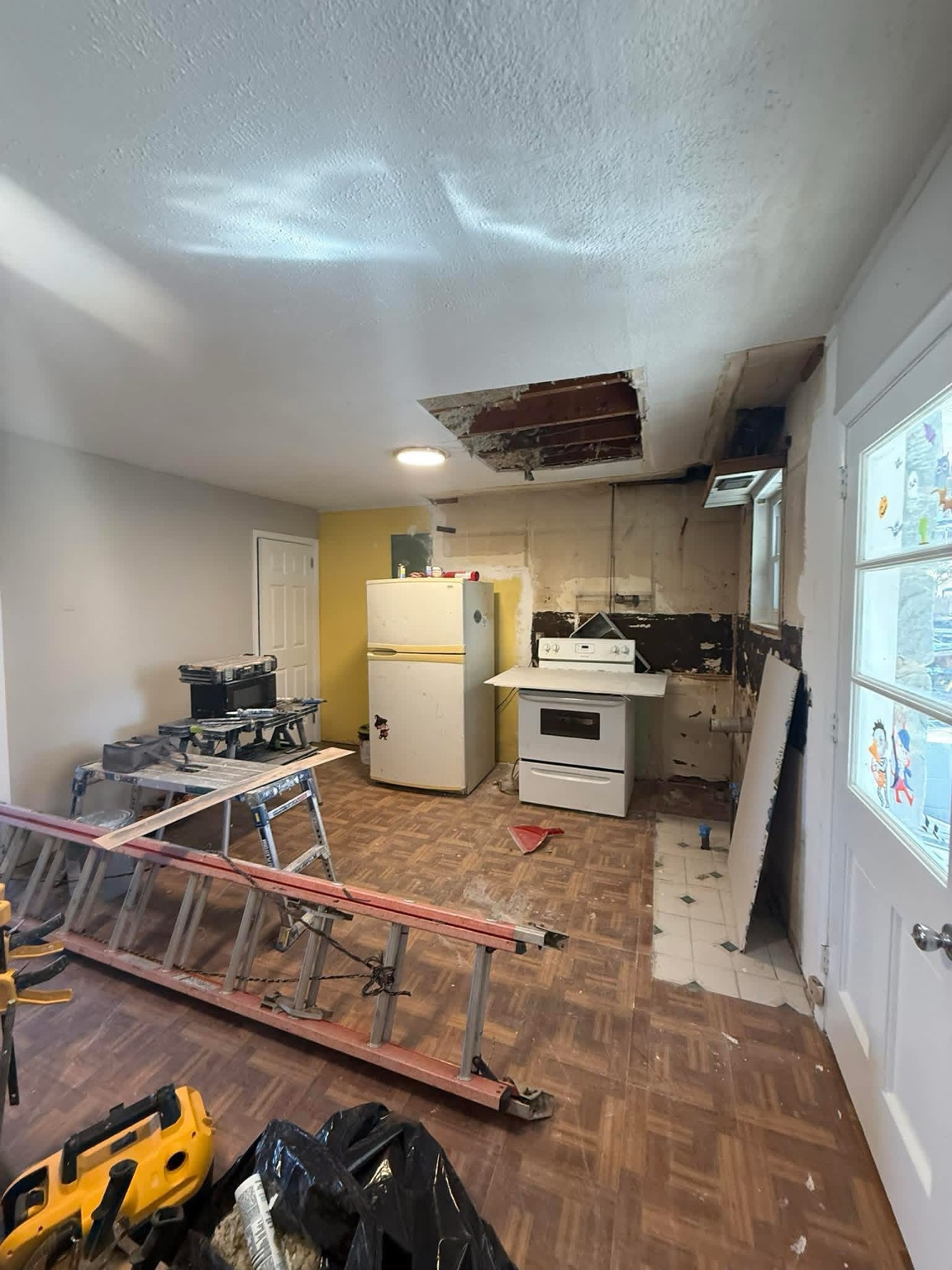 Kitchen and living area before renovation